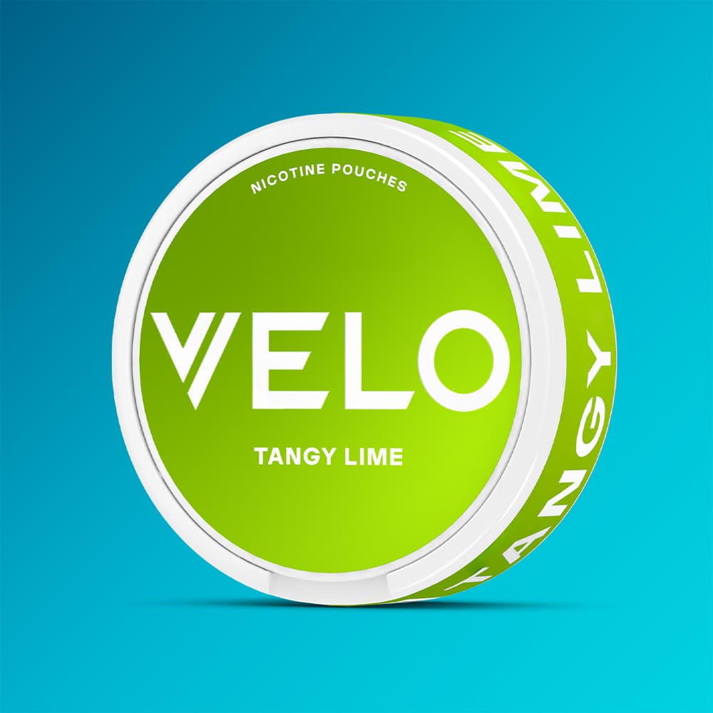 Velo Nicotine Pouches |  A round container labeled VELO Tangy Lime with a green and white design is shown against a blue gradient background, emphasizing the citrusy lime flavour and zesty zing of VELO’s Tangy Lime nicotine pouches.