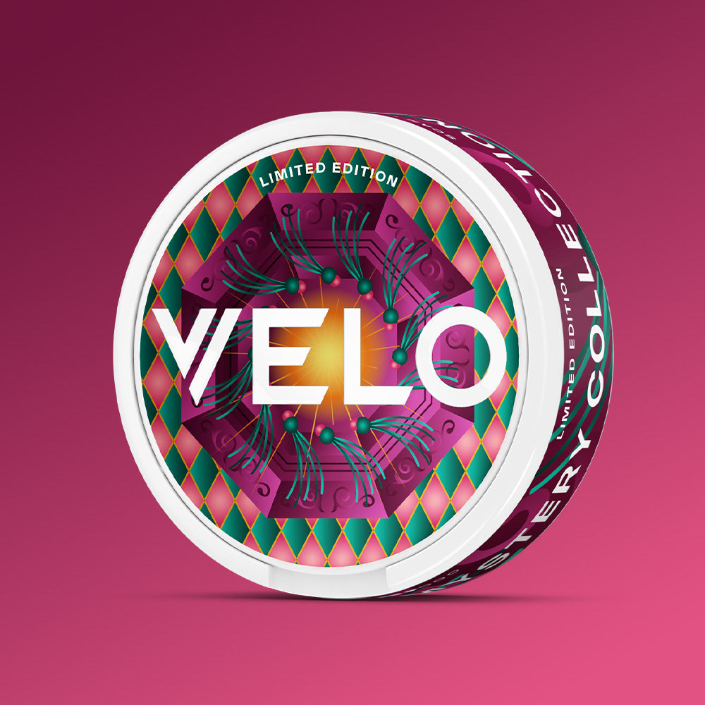 Velo Nicotine Pouches |  A circular Mystery Collection 3 nicotine pouch tin with white edges and a vibrant, geometric purple and teal pattern, featuring the VELO logo in the center and LIMITED EDITION along the perimeter.