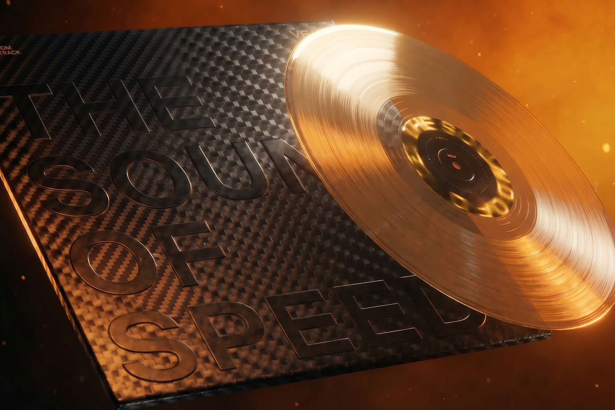 Velo Nicotine Pouches |  A shiny gold vinyl record partially rests on a textured black album cover with embossed text reading THE SOUND OF SPEED against a warm, glowing background—an image that captures the sleek thrill of Velo nicotine pouches and the pulse of modern rhythm.