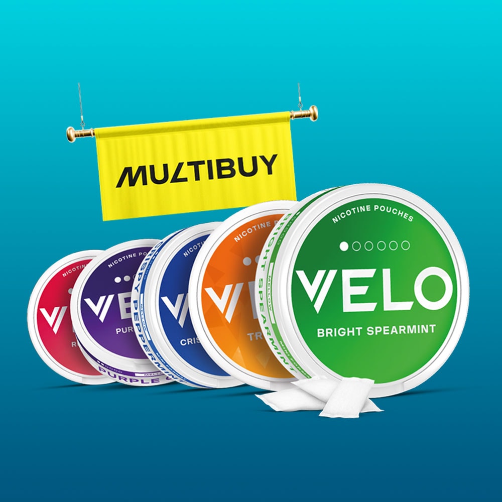 Velo Nicotine Pouches |  Five colorful VELO nicotine pouch containers are displayed in a row on a blue background, with a yellow “MULTIBUY” banner above them. These VELO pouches come in vibrant flavors including Bright Spearmint, Tropic, Crispy, Purple, and Ruby.
